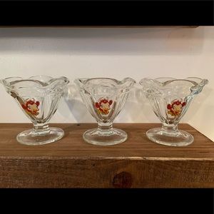 3 vintage Borden’s Elsie the Cow ice cream dishes.